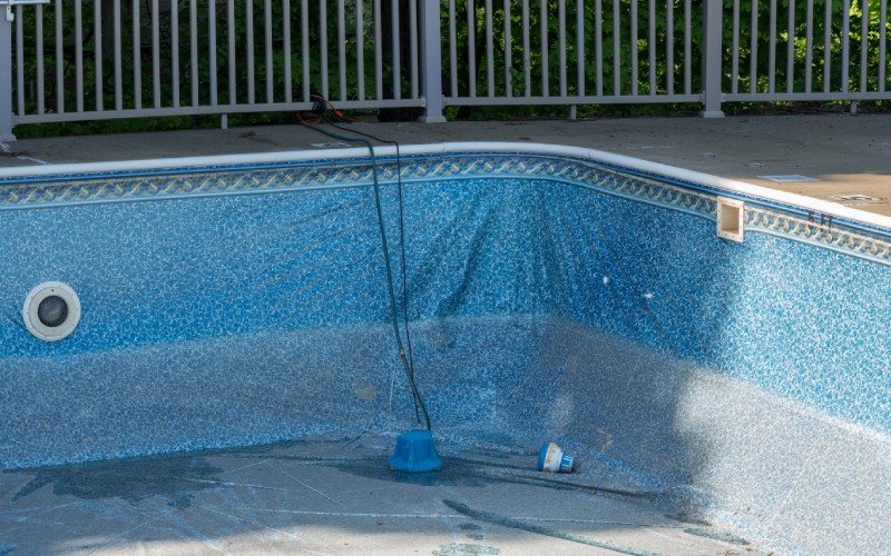 replacing and repairing old vinyl liner of swimming pool