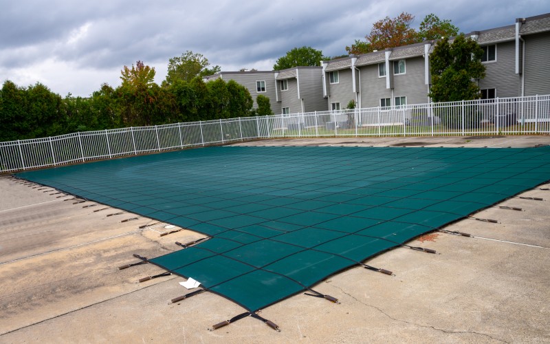 backyard swimming pool closed winter summer